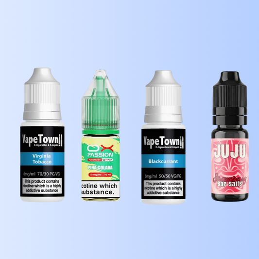 Nic salt and freebase e-liquid bottles on a light blue background